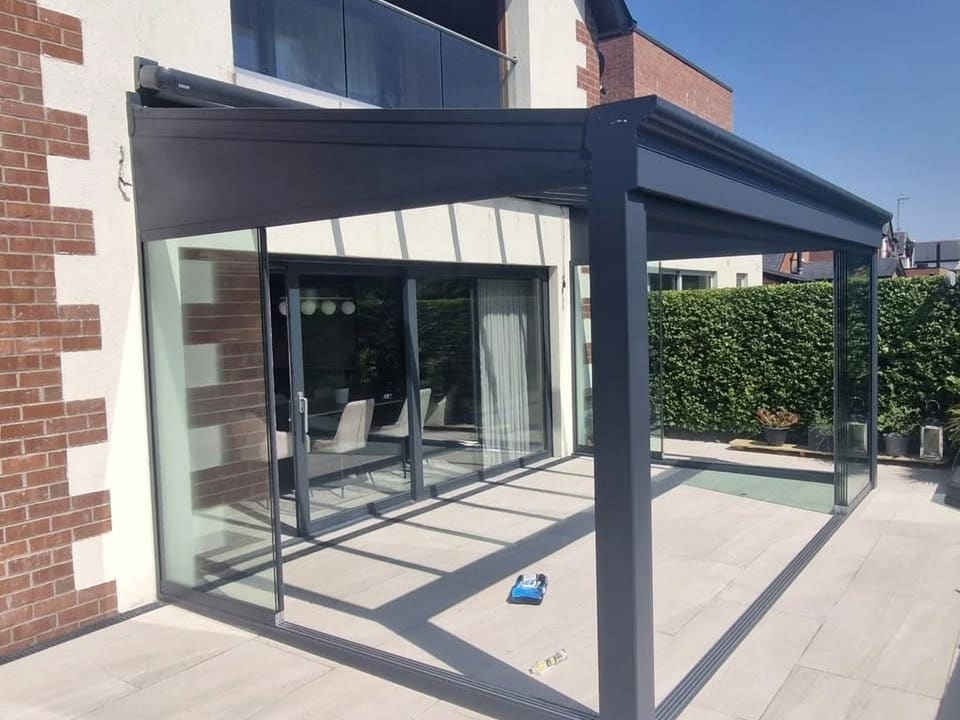 Slate grey glass roof veranda over a patio in Northern Ireland