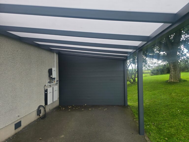 Carport over the drive at the side of a house